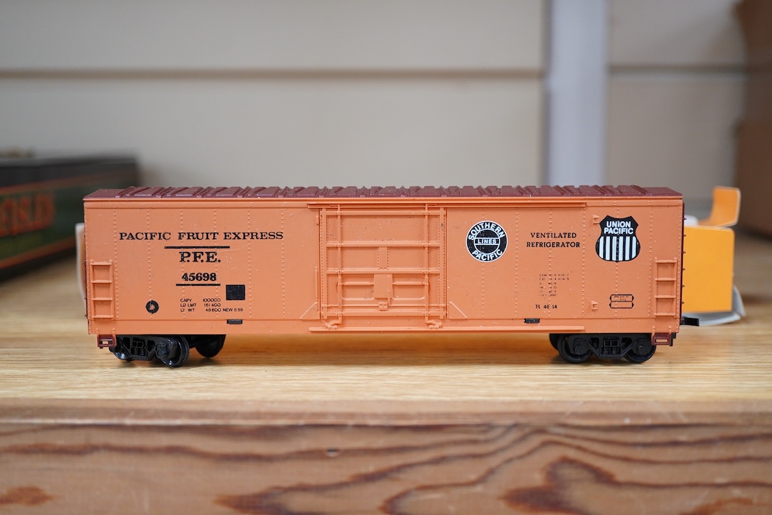 A quantity of US outline HO railway by Athearn, Bachmann, etc. including three locomotives; a Union Pacific Bo-Bo diesel, 1468, a Santa Fe Bo-Bo diesel, 5707, and a Santa Fe 0-4-0 tender engine, together with a 12-wheel